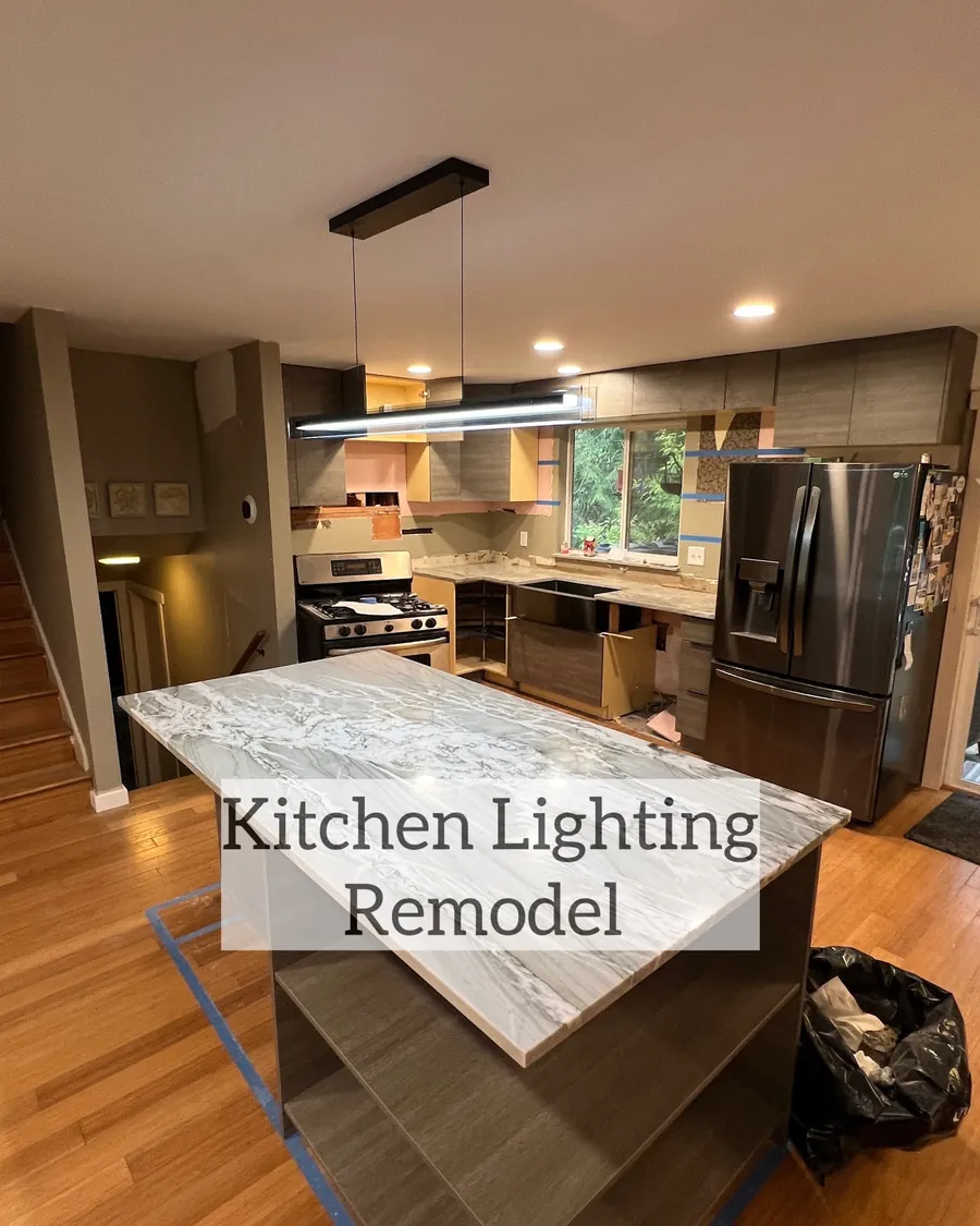 Kitchen island pendant light and recessed cans during a kitchen lighting remodel