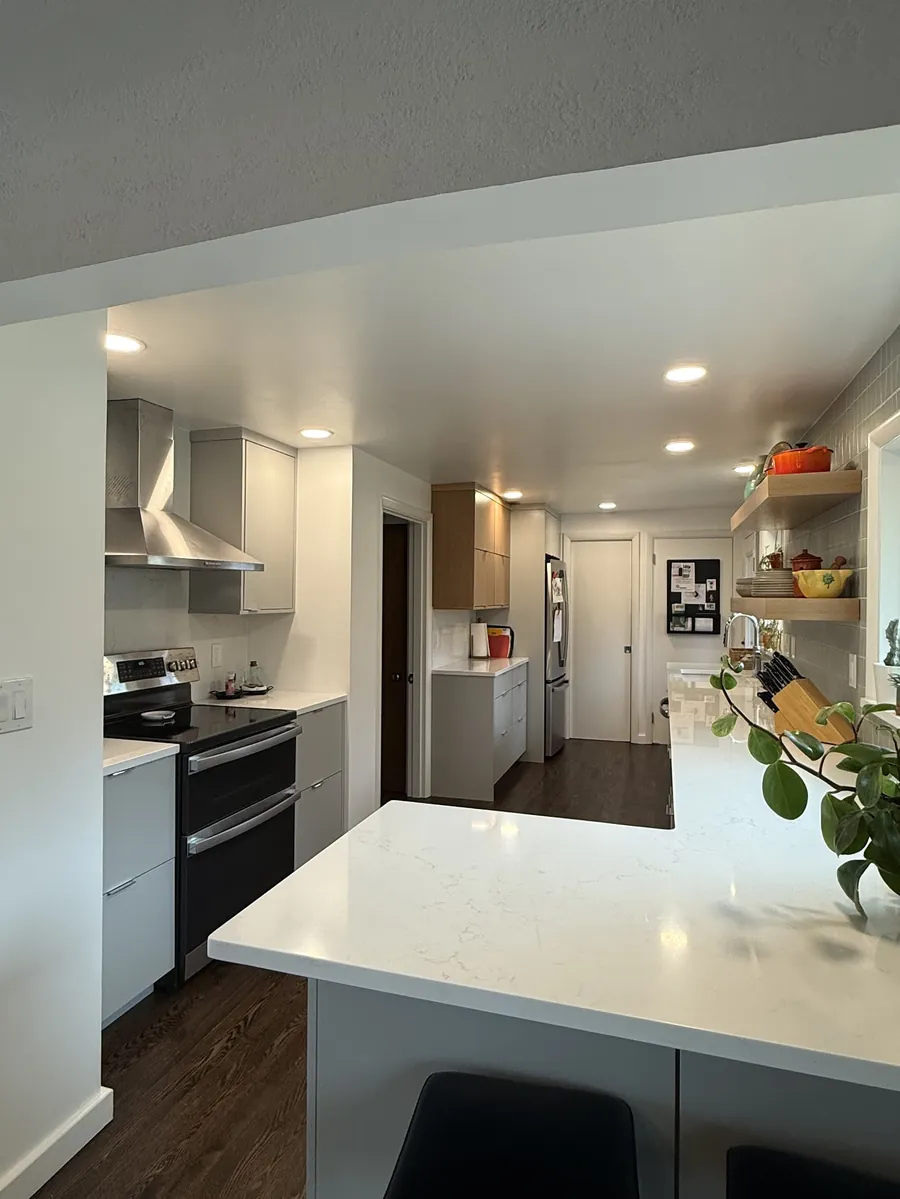 Finished kitchen with recessed ceiling can lights